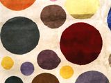 an image of a rug with a lot of circles on it
