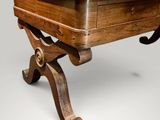an image of a wooden table with a drawer underneath it