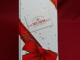 an image of a white box with a red bow on it