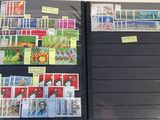 a lot of stamps on the pages of a book