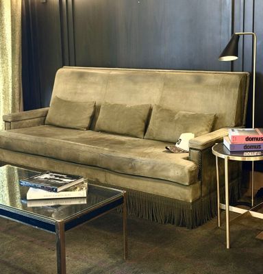 a living room with a couch and a coffee table