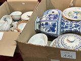 two boxes with different types of vases in them