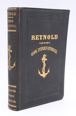 a close up of a book with an anchor on it