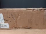 a cardboard box sitting on top of a wooden table