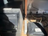two computers sitting next to each other on the floor