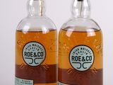 two bottles of roe & co small batch bourbon