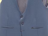 a blue vest with a black tie on a hanger