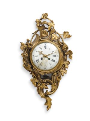 HORLOGE EN CARTEL HORLOGE EN CARTEL caisse de bronze doré ci…