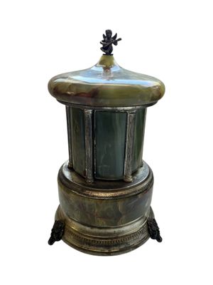 an image of a green and gold vase on a white background