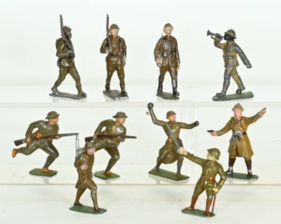 six figurines of men in military uniforms on display