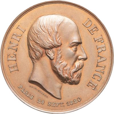 an image of a close up of a coin with a man ' s face