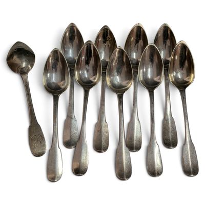six spoons are lined up in a row on a white surface