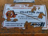 a sign on the side of a building that says villaton jean