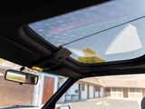 a view of the sunroof from inside of a car