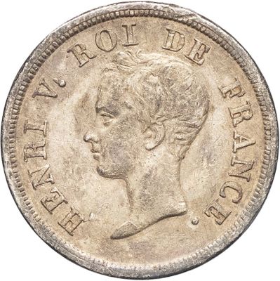 gros plan d'une pièce de monnaie sur fond blanc