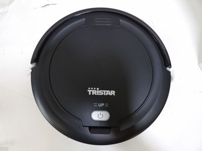 a black robot that is sitting on a table