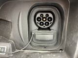 a close up of a car ' s electrical outlet with wires