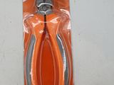 a pair of pliers in a package on a table