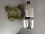 a stuffed animal next to a blender on the wall