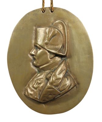 an image of a gold medal with a man in a hat