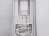 a white box with a charger inside of it