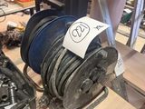 une photo d'une grande bobine de fil électrique