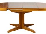 an image of a wooden table with two leaves on it