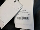 a picture of a label on a black jacket
