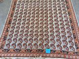 an oriental rug is on display in a store