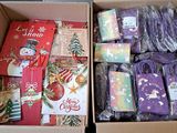 two boxes of christmas presents in the box on the floor