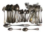 a lot of spoons and spoon spoons on the table