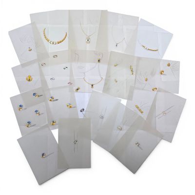 a bunch of white cards with different designs on them