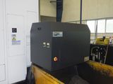 a machine that is sitting on top of a wooden box