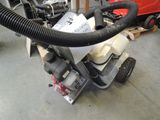 an image of a machine with a blower attached to it
