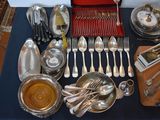 a table with silverware and silverware on it