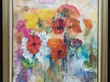 tableau représentant des fleurs dans un vase posé sur une table, sur fond noir