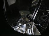 a close up of a clear glass vase on a table