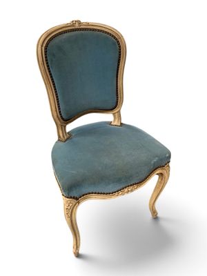 an image of a chair with a blue upholstered seat on a white background