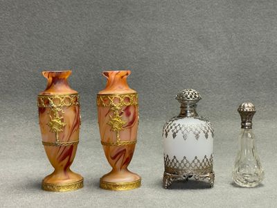 three vases sitting next to each other on a table