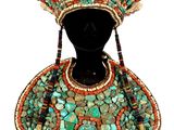 a close up of a mannequin wearing a hat and dress