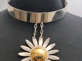 a close up of a necklace on a mannequin mannequin mannequin mannequin mannequin mannequin mannequin mannequin