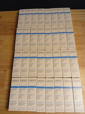 a stack of white boxes sitting on a wooden table