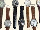 a lot of watches that are all different colors and sizes