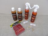 une bouteille de liquide, une bouteille de liquide et quelques autres objets posés sur une table