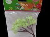 a plastic bag with a bunch of green flowers in it