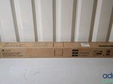 a box with a black and white label on it sitting on top of a table