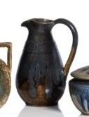 several different types of vases are displayed on a white surface