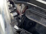 a car that has its hood open with the hood up
