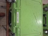 a green box that is sitting on top of a table