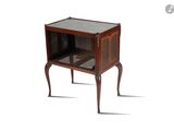 an image of a small wooden table with a glass top